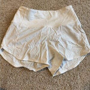Lululemon Athletica Cream Athletic Shorts